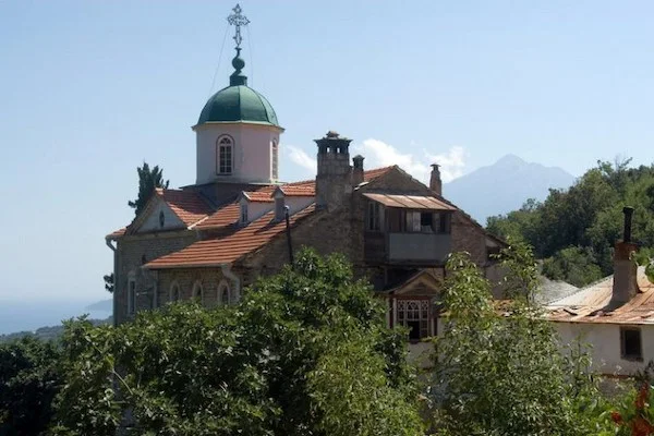 The historic Bogoroditsa Skete, also known as Xylourgou, with its distinctive green dome on Mount Athos.