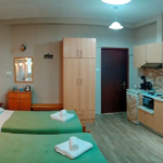 Ground floor triple studio bedroom at Prosforio Rooms in Ouranoupoli Chalkidiki.