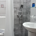 Bathroom inside the ground floor triple studio at Prosforio Rooms in Ouranoupoli Chalkidiki